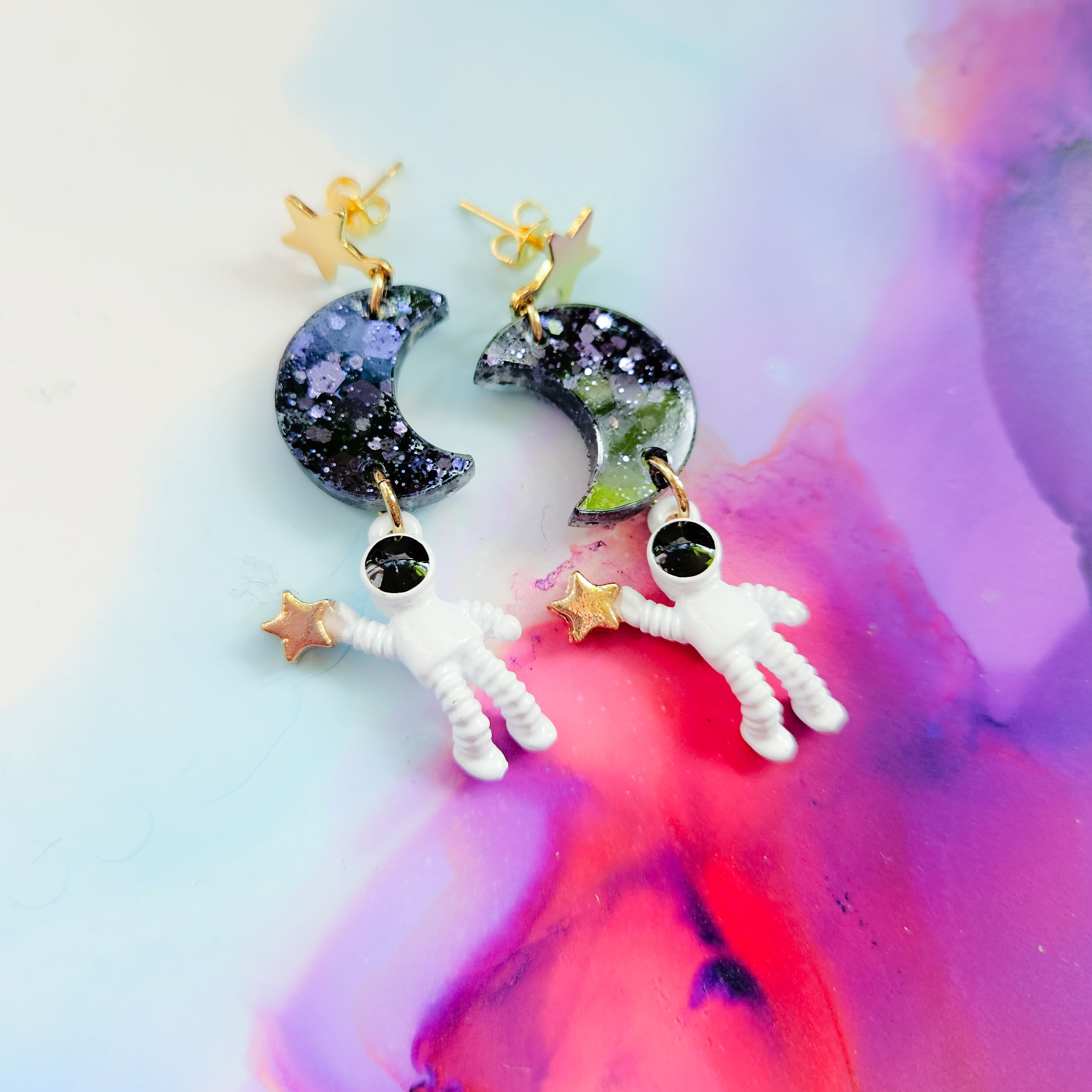 Handmade spaceman and resin moon charm earrings