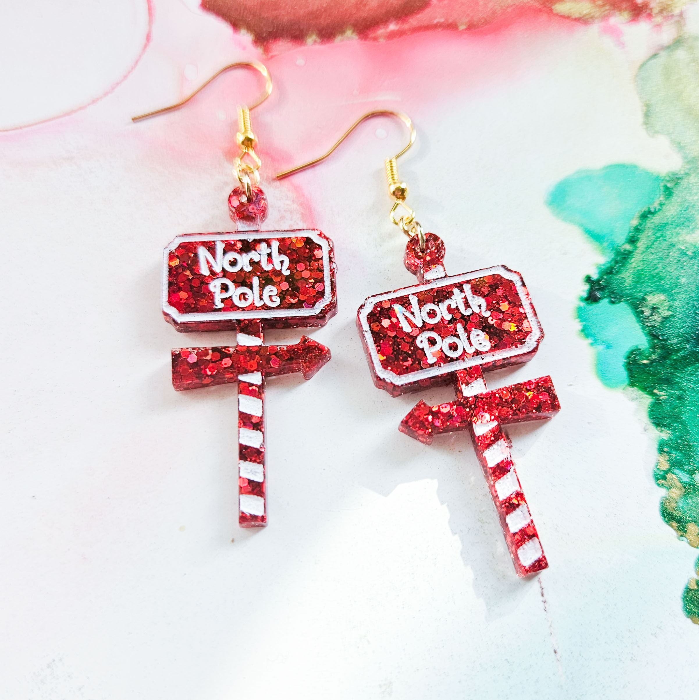 Handmade north pole sign resin glitter resin Christmas earrings