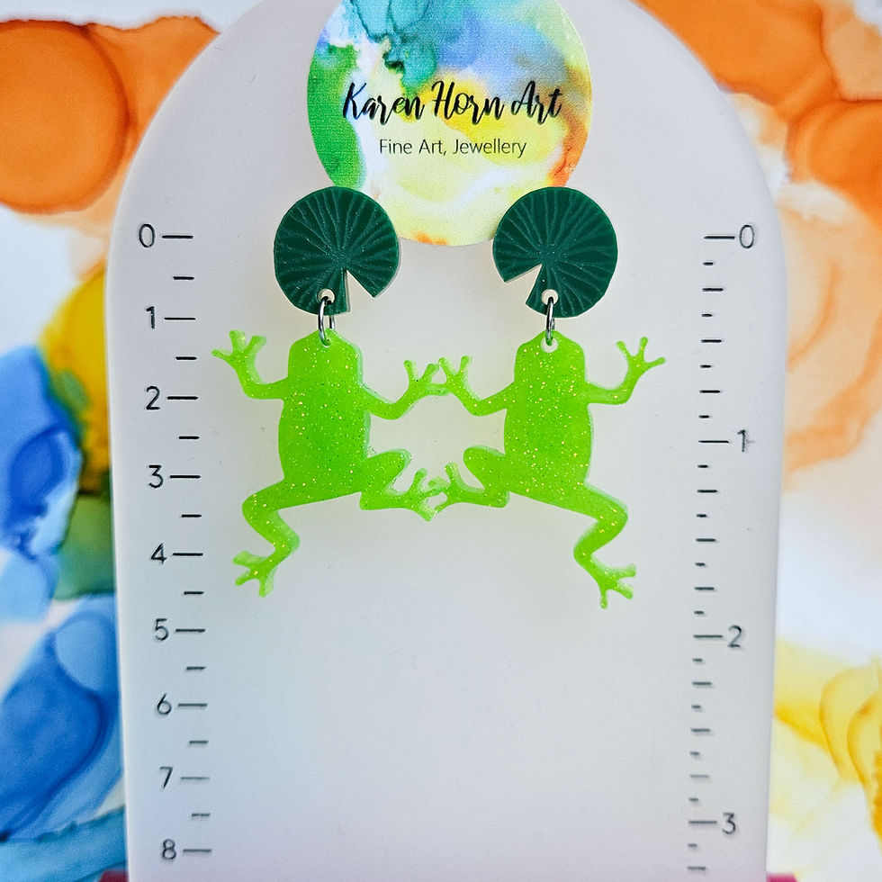 Thumbnail: Handmade green frogs and lily pad resin earrings