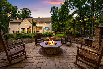This full-scale outdoor renovation in Salisbury, Midlothian included a new TimberTech deck, Belgard paver patio with seat walls and fire pit, detached shed with James Hardie siding, updated fencing, and a complete front-facing siding upgrade—all designed for low-maintenance living and year-round enjoyment.