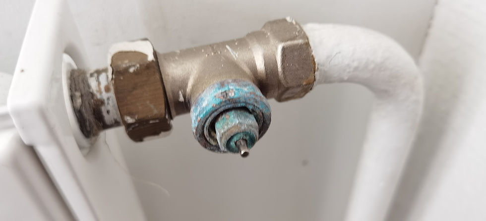 Kanavansuu School Renovation – Gamified Cohousing Lappeenranta: Broken heating pipes, the condition of many of the heaters when we bought the school in 2023