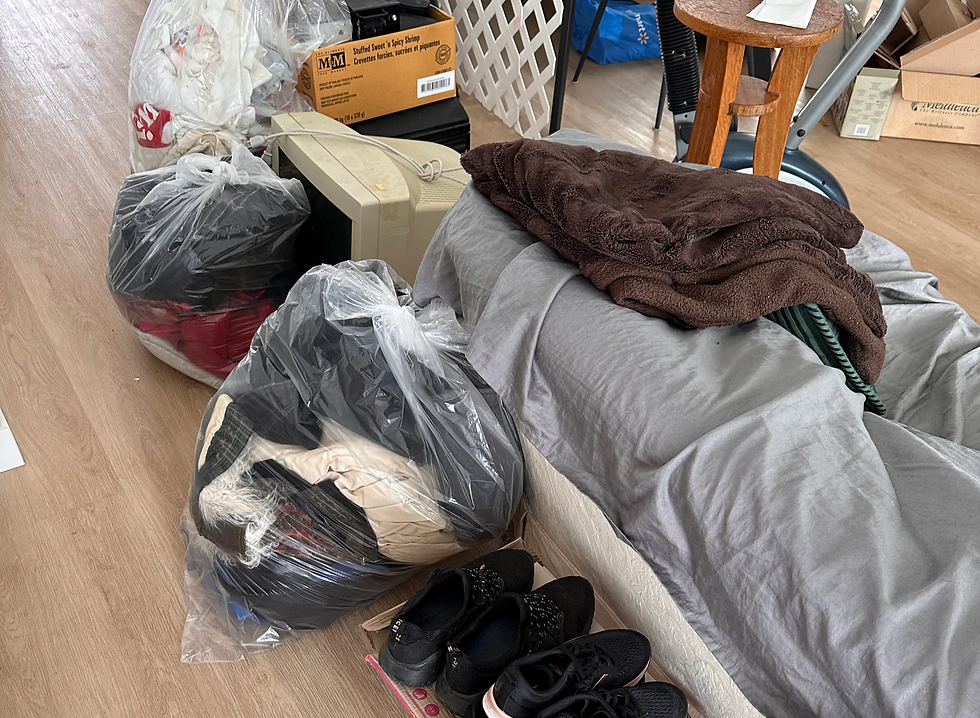 large bags full of a clients belongings after they were organized by the staff at Sort & Simple in Edmonton