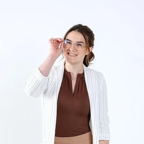 syd headshot aug 2025 (1).webp