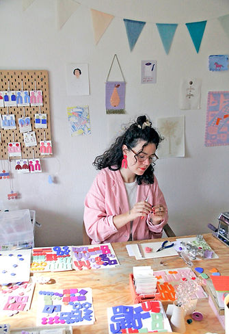In my studio making polymer clay earrings