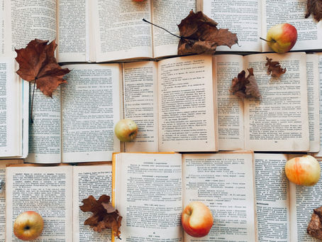 Gallery wall of books and pumpkins