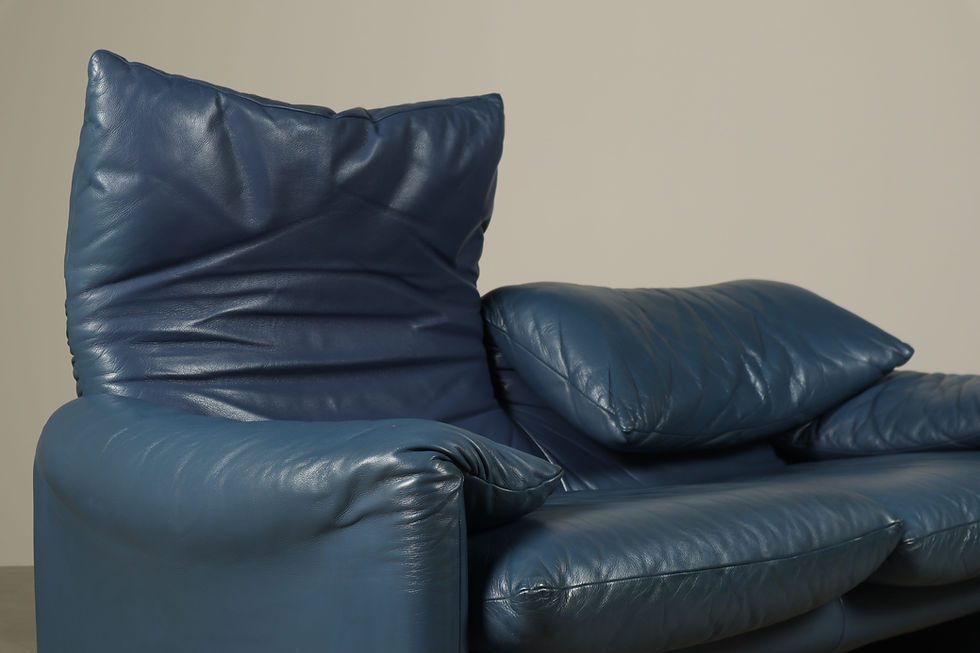 Thumbnail: Detail of the adjustable back cushion and supple blue leather with natural creasing and patina.