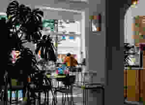 Woman working in a cafe.