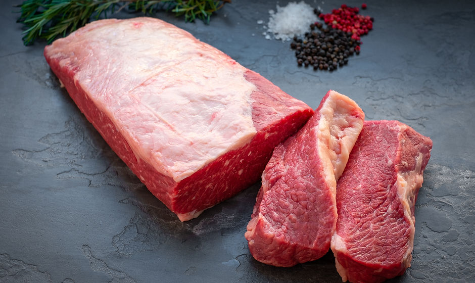 A whole piece of Beef Brisket with slice