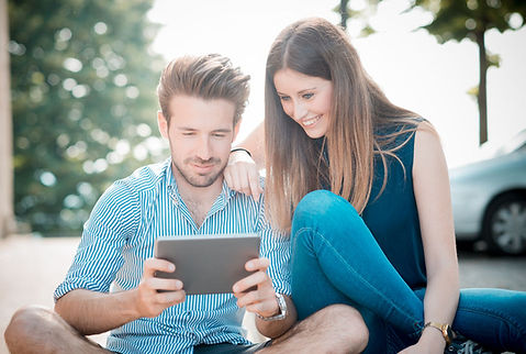 Couple looking at tablet