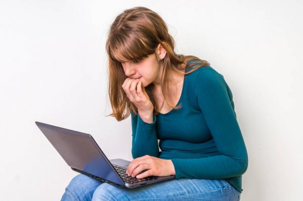 Teen bad posture on laptop