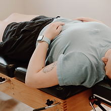 perinatal-chiropractic-care-delray-beach-boca-raton-woman-getting-adjusted-for-postpartum-