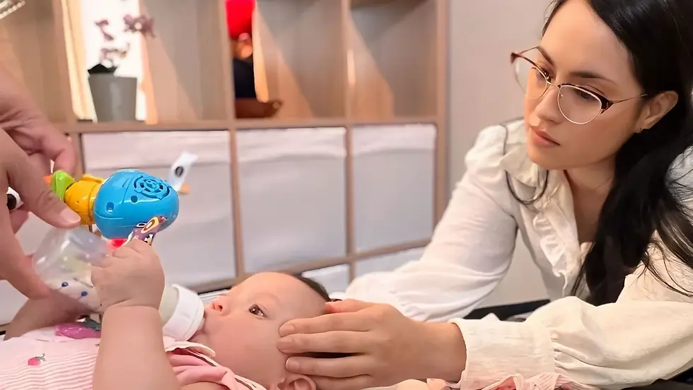 Pediatric and prenatal chiropractor in Delray Beach adjusting a baby at Soma Chiropractic