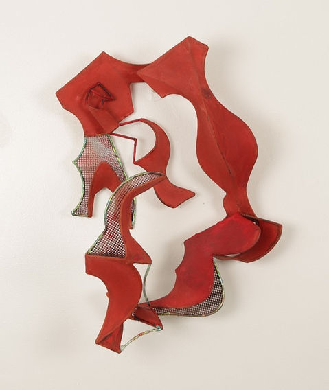 This wall sculpture is depicting birds and fish coexisting in the same environment.