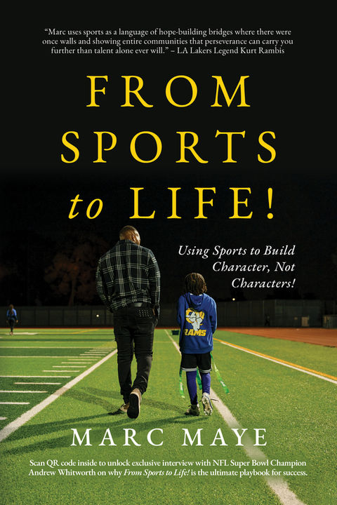 front cover with Marc and a student walking on the field