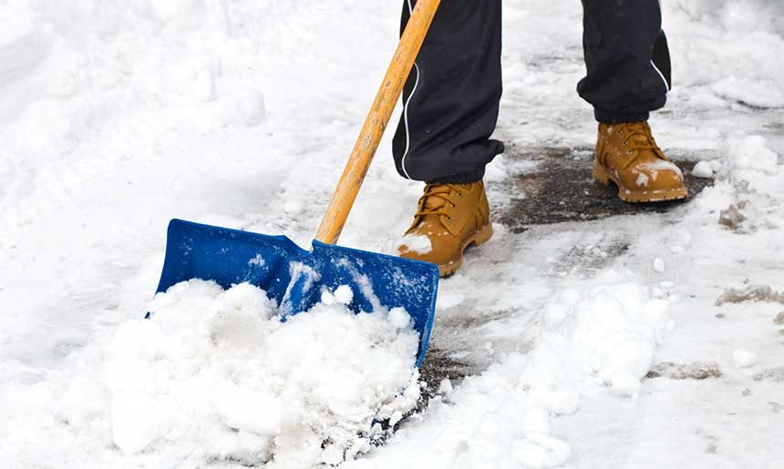 Snow shovel on sidewalk