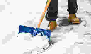 Snow shovel on sidewalk