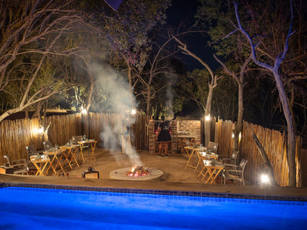 Villa's pool and private boma area 