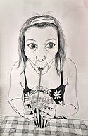 girl drinking through a straw