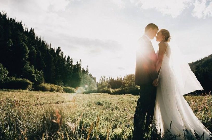 Wedding couple in field