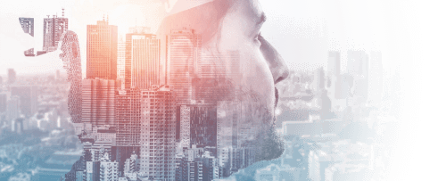 Profile of a man overlaid with a cityscape for future planning concepts.