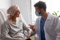 health-assistant-taking-care-of-female-patient.jpg