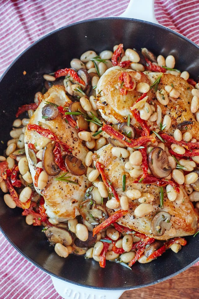 Chicken and white bean one skillet meal recipe with thyme and sun-dried tomatoes