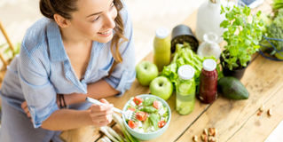 healthy happy woman, anti-inflammatory healthy food, food preparing, kitchen counter, organic food, natural kitchen.