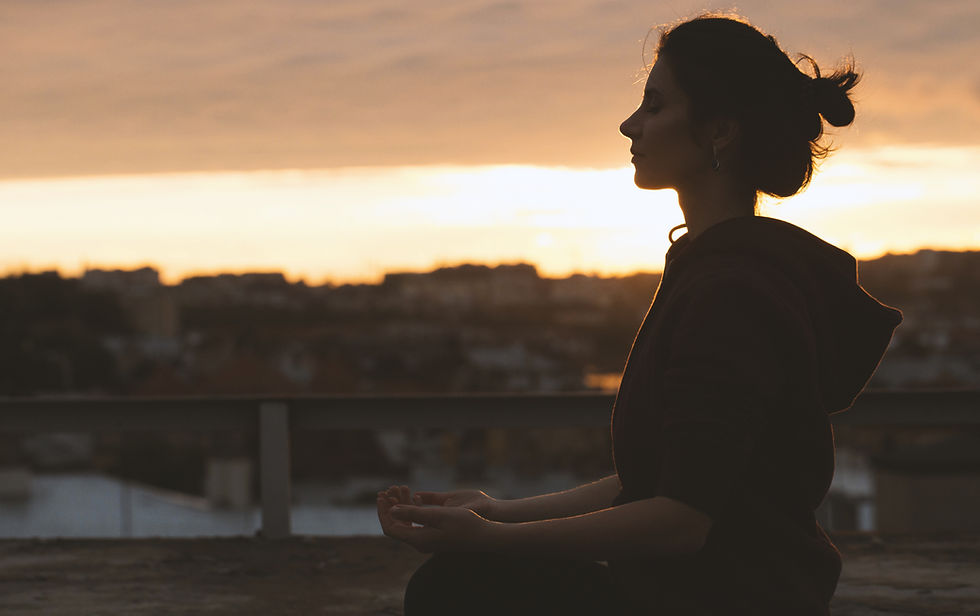 Woman in quiet meditation representing the emotional healing journey alongside physical endometriosis recovery