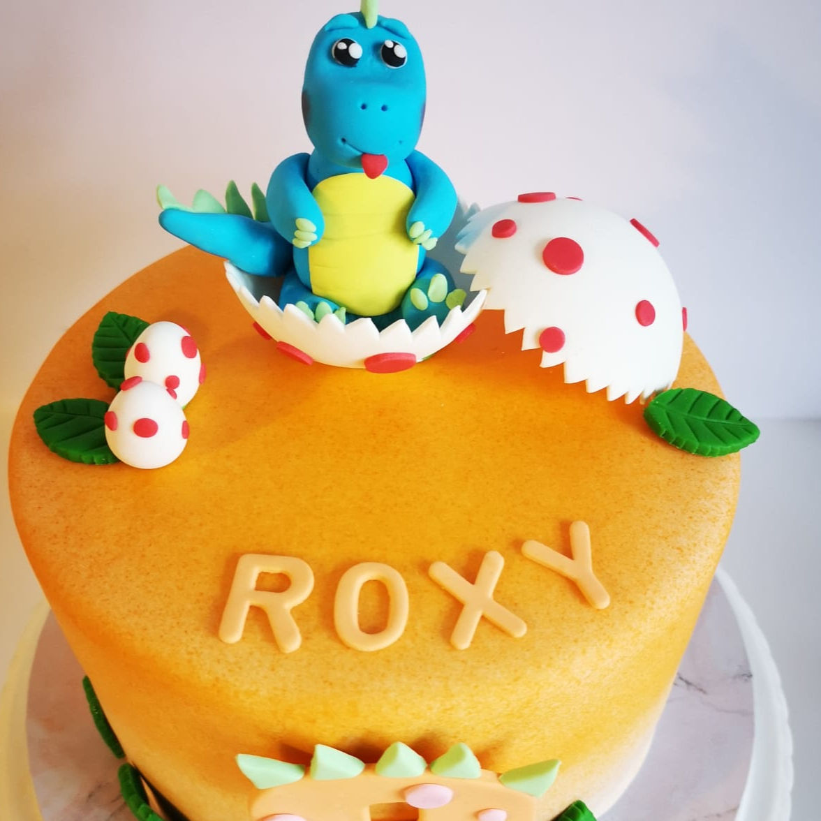 Cute dino birthday cake