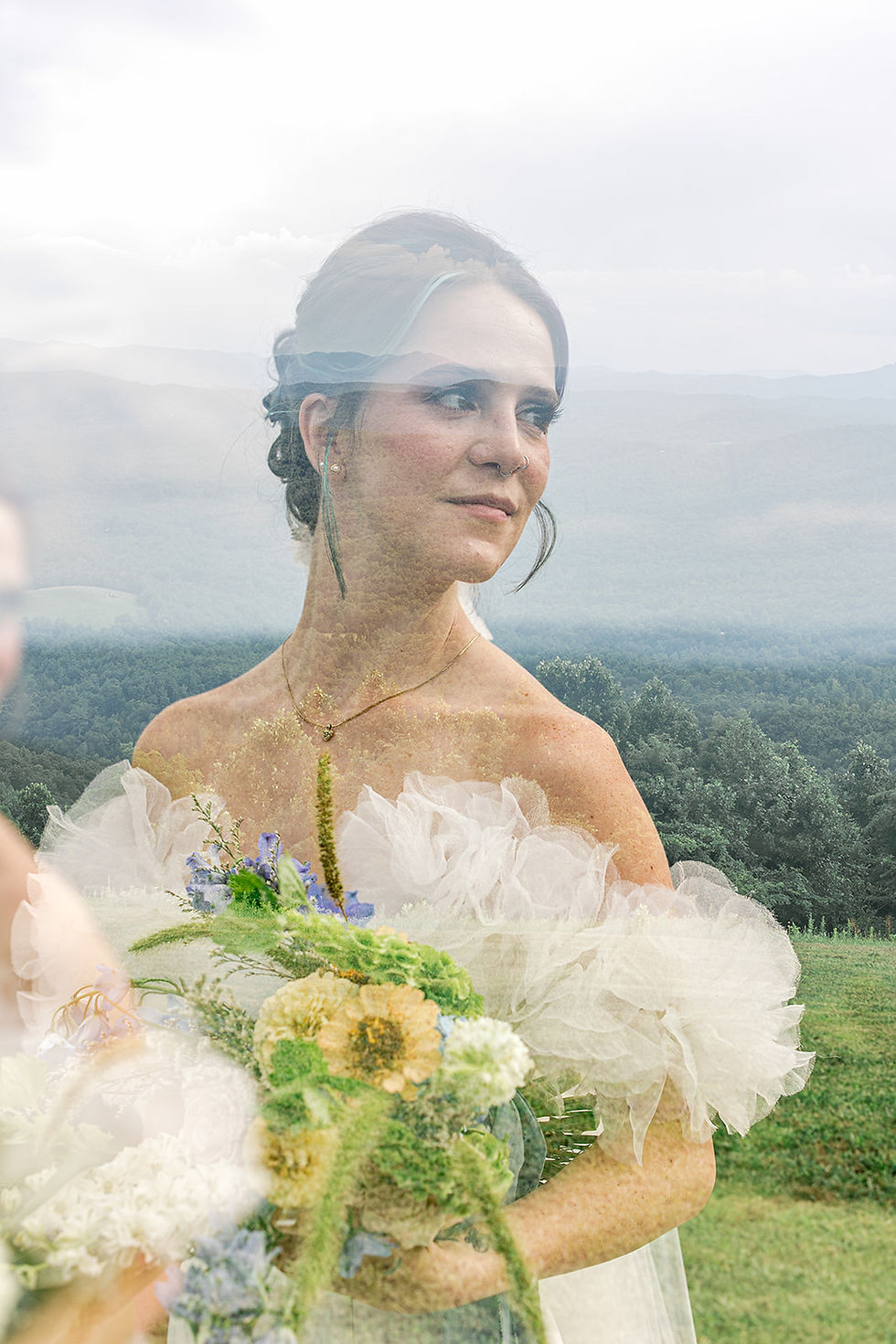 Woman in ruffled wedding dress with colorful bouquet