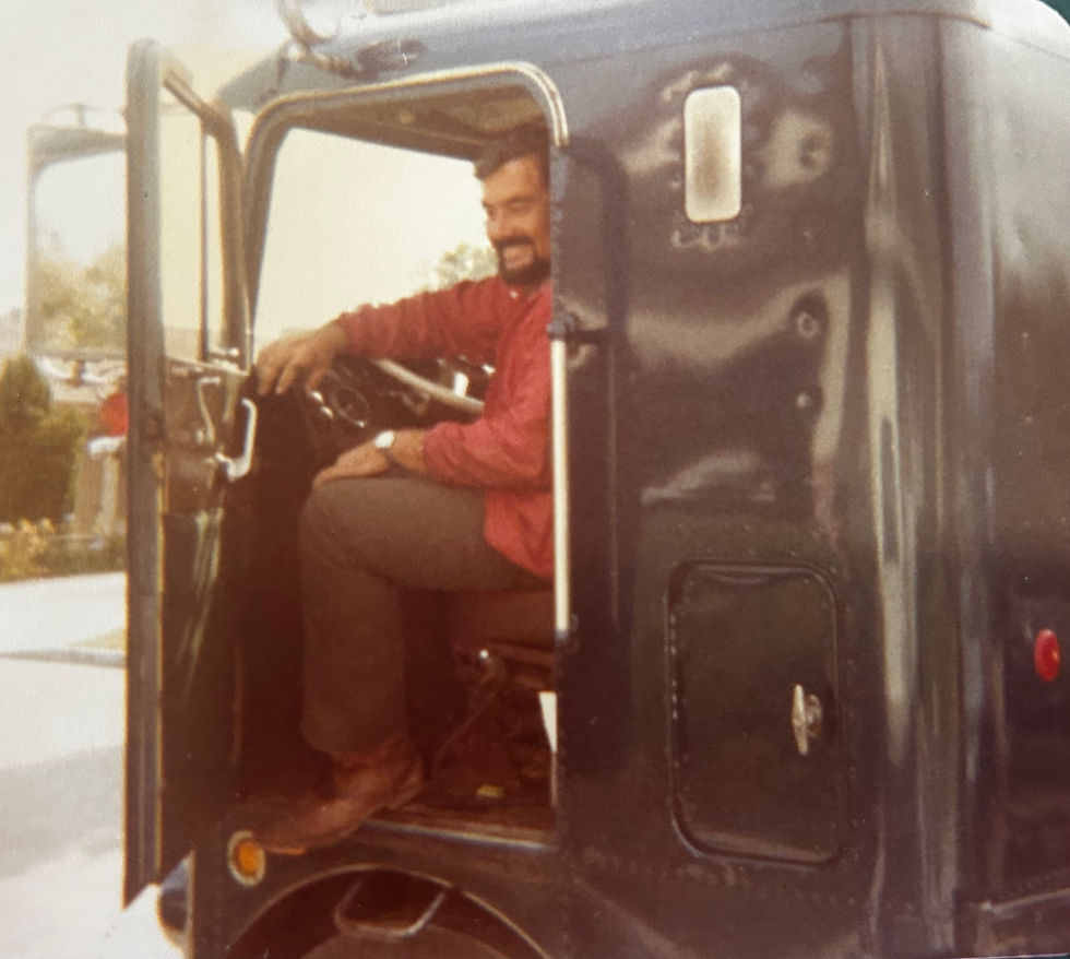 Dad in his prime, driving his truck. Ca. 1978.