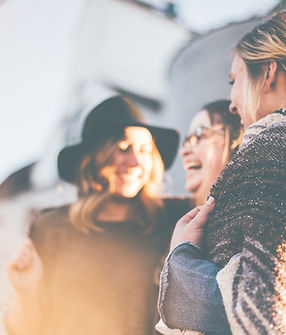 people laughing and talking outside during daytime_edited.jpg