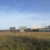 Panoramic view of the Friche Josaphat grassland in Schaerbeek under a blue sky