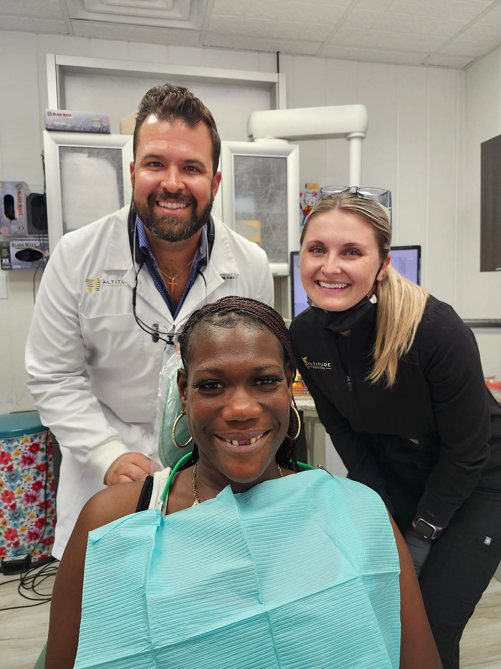 Eugena (before) with Dr. Matthew Rolfes of Altitude Dental and assistant
