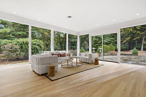 10 -MainLivingwithFloortoCeilingWindows2.JPG