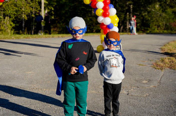 Race day super heros posing