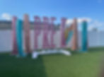 Colorful large-scale custom marquee letters spelling PRE-K with sequin backdrops for a fun school milestone celebration.