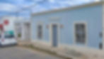 The "light blue house".