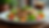 Wide angle view of a vibrant salad with grilled chicken and colorful vegetables