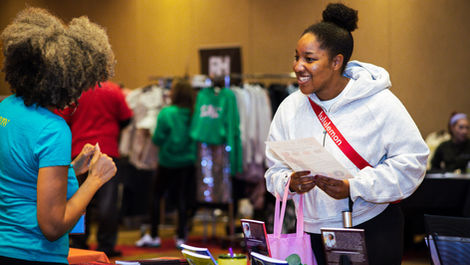 Fit & Fabulous Vendor Making Guest Smile.