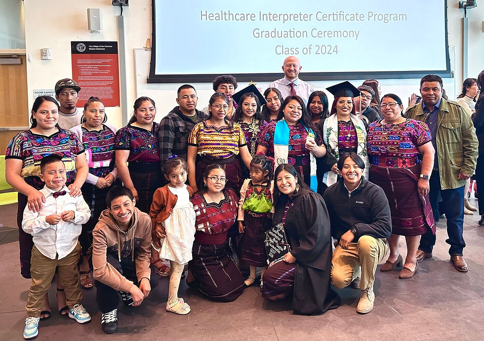 Posing with a group of Mam women who graduated from a Healthcare Interpreting Certificate program in San Francisco.