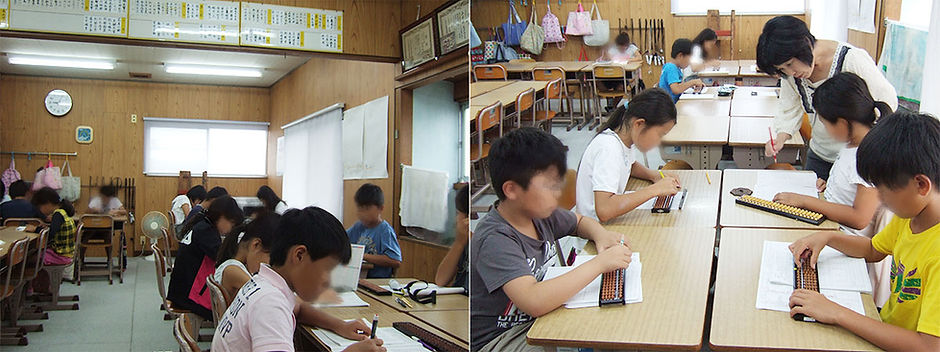 ソロバンをしている子どもたち