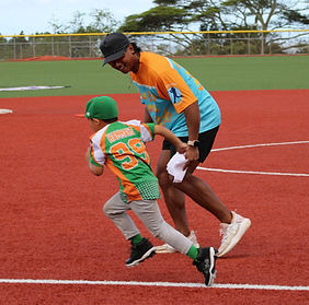 Coach Matt running alongside young athlete