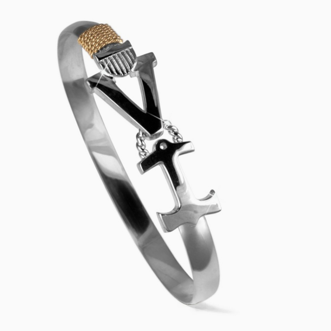Virgin Islands VI hook bracelet in hammered sterling silver with 14k gold wire wrap.