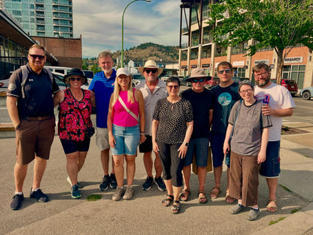 Group of happy food tour guests