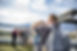Taking picture of guests with Okanagan Lake in background