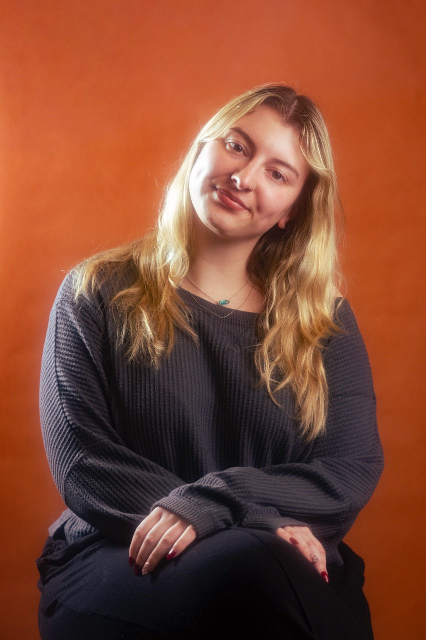 headshot-reilly-orange-2 Large.jpeg