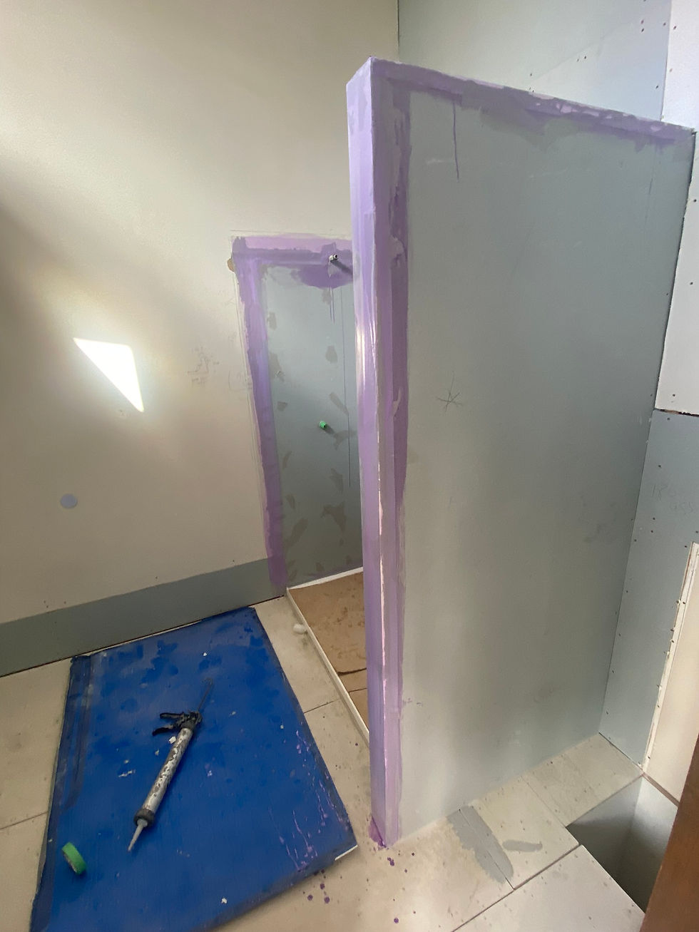 Purple primer applied to corners and edges
