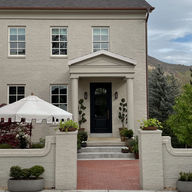 stone and masonry decorated house front exterior