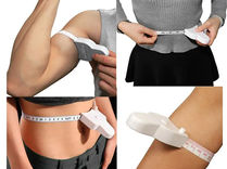 Mètre ruban couturière automatique utilisé pour prendre les mesures d'un tissu.